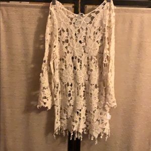 Brand new. Knitted Top. Fits like a small.